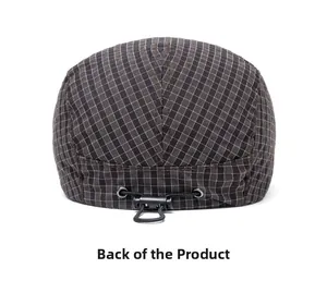 Rear view of brown plaid flat cap showing adjustable drawstring toggle for custom fit