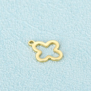 Golden hollow clover pendant accessory in stainless steel with top ring detail