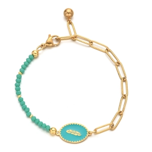 Detail of gold enamel feather charm bracelet with blue-green beads on white background
