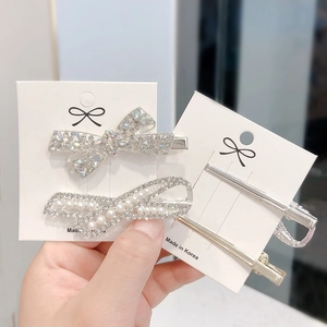 Sparkling crystal bow hair clip and pearl rhinestone side clip on display cards