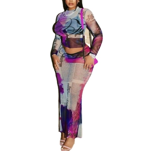 Sexy mesh two-piece set featuring long sleeve crop top and slim fit skirt with newspaper print