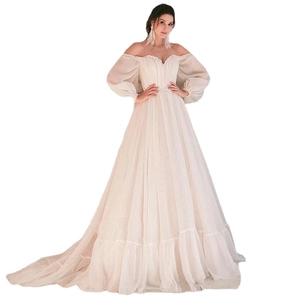 Elegant off-the-shoulder wedding dress with sheer puff sleeves and A-line tulle skirt