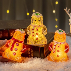 Luminous gingerbread man Christmas figurine with warm LED light for holiday home decoration