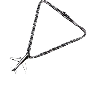 Hip hop style silver airplane pendant necklace for boys and girls on white background