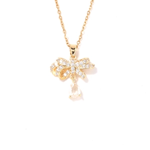 Elegant gold bow necklace with micro-pave zircons and sparkling teardrop stone pendant