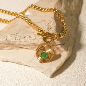 Gold stainless steel heart pendant necklace with green emerald stone on stone base