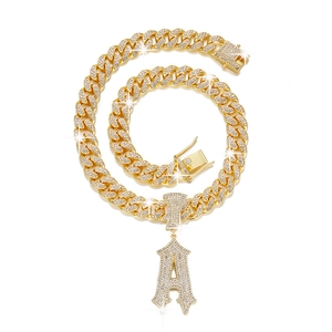 Gold plated cuban chain necklace with iced-out letter A pendant and sparkling rhinestones