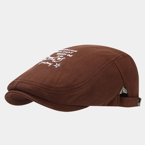 Detail of dark brown cotton ivy cap with Lucky Happy Day embroidery and metal side snaps