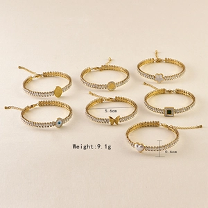 Gold plated bracelets with zircons and charms like evil eye, butterfly and heart shapes