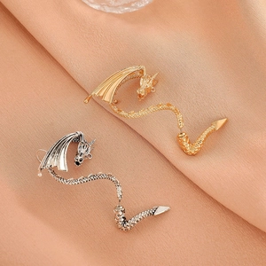Punk dragon ear cuffs in vintage silver and gold plating with detailed wing scales