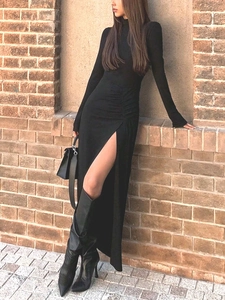 Elegant black turtleneck long sleeve bodycon dress with side ruched detail and high slit