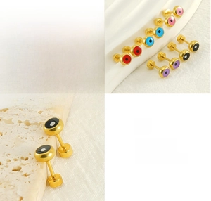 Détails macro des boucles d'oreilles œil porte-bonheur en or 18 carats de couleurs vives