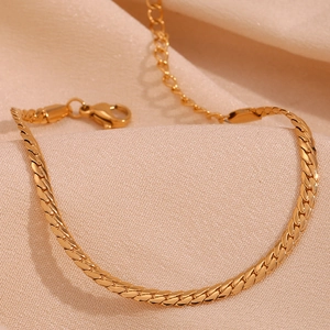 Detailed close-up of 18K gold plated stainless steel flat snake chain with lobster clasp