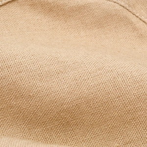 Women's wide brim sun hat in natural burlap weave texture with UV protection for beach