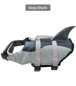 Detail view of shark fin handle and adjustable buckles on the gray dog life jacket