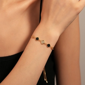 Vintage adjustable gold bracelet with black square enamel and zircon geometric pendants