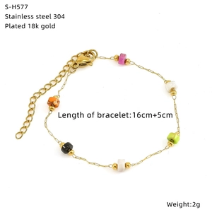 Close-up of 18k gold plated bracelet with colorful glass beads and dimensions detail