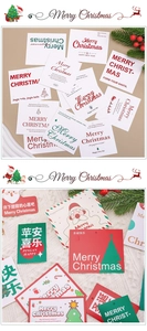 Close-up of assorted festive Christmas tree gift tags with holiday illustrations