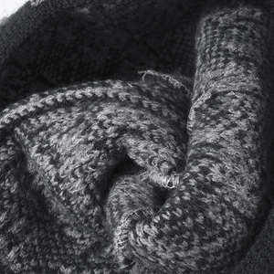 Thick dark grey knitted wool beanie for women with warm textured jacquard pattern