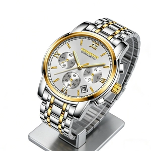 Close-up of elegant men's two-tone stainless steel watch with calendar and sub-dials