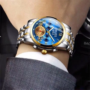 Close-up of ORUSS mens business watch featuring blue sunray dial and two-tone steel band