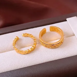 24k gold-plated vintage open ring set with textured wavy bands and inner character carving