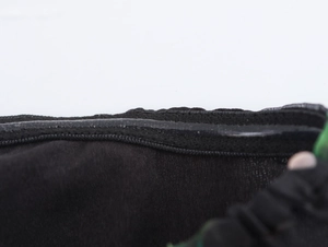 Detail of black bodice with non-slip silicone strips on the elastic edge for secure fit