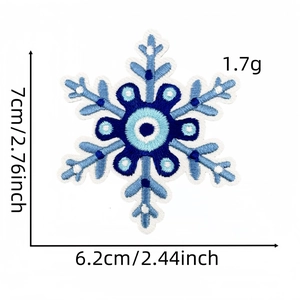 Detail view of blue snowflake embroidery patch with exact dimensions and 1.7g weight