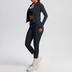 Detail view of high-waist fitness leggings with side pockets and smooth seams