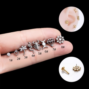 G23 titanium labret studs set with snake dragonfly and opal designs for ear piercings