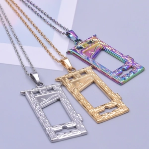 Detailed view of guillotine pendant necklaces in gold, silver, and rainbow finishes