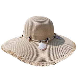 Beige woven straw sun hat with shell and wood bead trim featuring frayed brim design