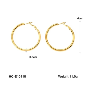 Detail view of 18K gold plated hoop earrings showing 4cm diameter and 11g weight specs