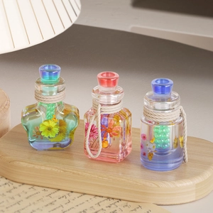 Handmade drift bottle silicone molds with dried flowers for DIY crystal resin crafts