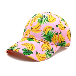 Detailed view of pink banana print baseball cap with vibrant tropical leaf patterns