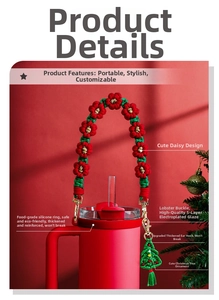 Close-up of Christmas daisy woven cup handle with holiday tree charm and red silicone ring