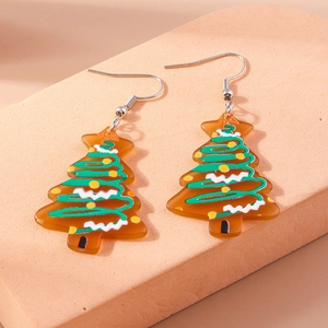 Detail of Christmas tree earrings with green spiral texture on semi-transparent brown resin