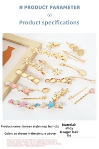 Flat lay of gold alloy hair clips featuring heart and flower shapes with enamel details