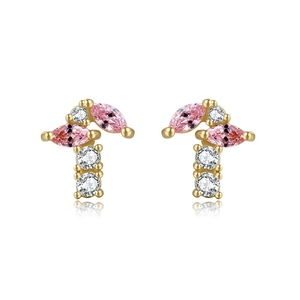 Detail of 18K gold plated fruit-shaped stud earrings with pink and white cubic zirconia