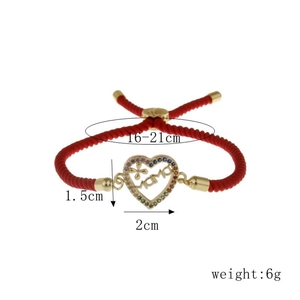 Detail view of MAMA heart pendant with colorful stones on red braided cord bracelet