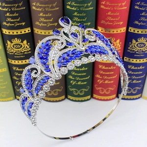 Detail of baroque bridal crown with blue teardrop rhinestones and sparkling crystals