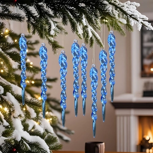 Set of 8 blue crystal icicle ornaments hanging on snow-covered Christmas tree branches