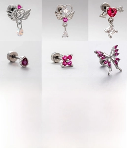 Detailed grid view of silver titanium steel piercing studs with zircon butterfly and heart