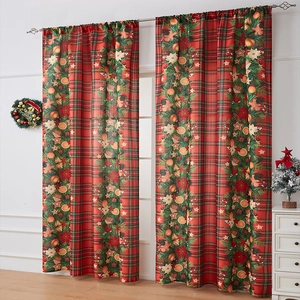 Detail of red plaid Christmas curtain featuring gingerbread and evergreen branch motifs
