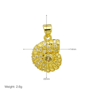 Detailed view of a gold-plated nautilus pendant with sparkling cubic zirconia stones
