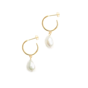 Golden stainless steel hoop earrings with natural white drop pearls on a white background