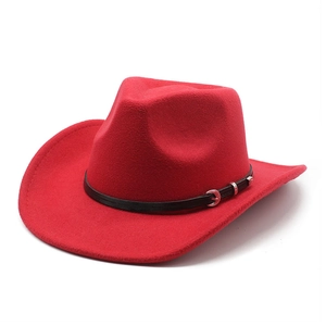 Detail of red wool felt cowboy hat featuring a black leather band and silver metal buckle