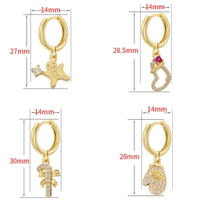 Detailed dimensions of gold Christmas earrings with gingerbread and candy cane charms