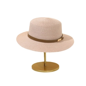 Vintage wide brim straw sun hat in light pink with brown leather band and metal buckle
