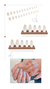 Detail of long coffin press-on nails with blue heart gradient design and fit guide